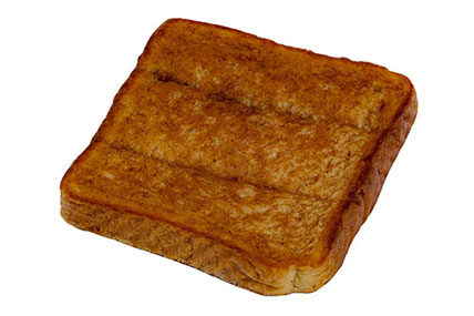 Perforated French toast slices cooked until golden brown