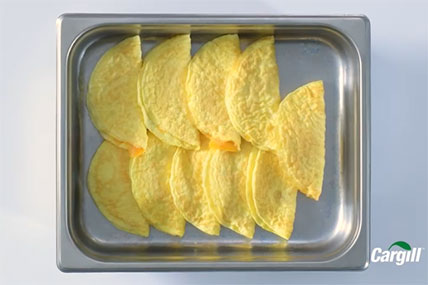 Folded omelets filled with melted cheese