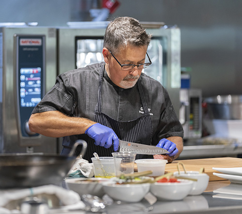 Chefs in the Kitchen Preparing a Meal