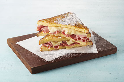 Ham and cheese breakfast sandwich made with French toast
